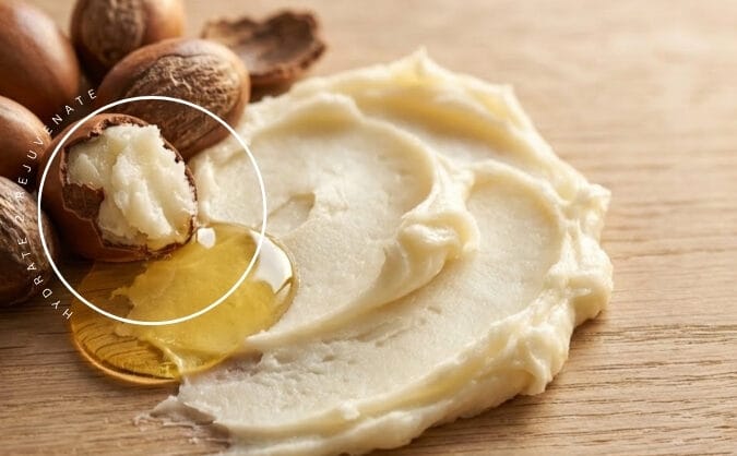 A spread of dr shea body butter laid on a wooden table showing texture and softness